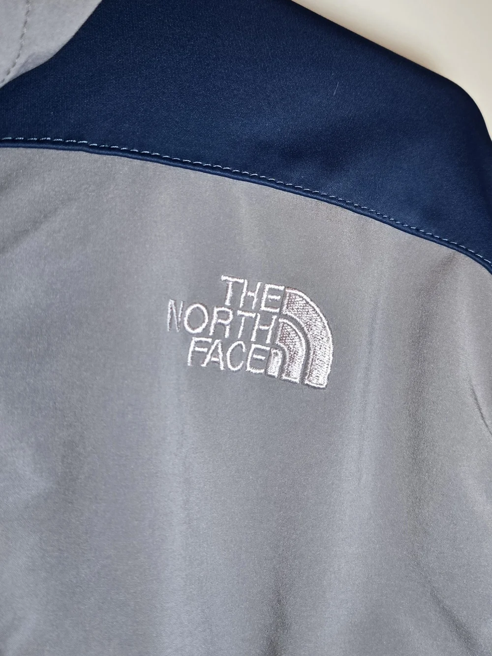 The North Face Men’s Blue & Gray Softshell Hooded Jacket